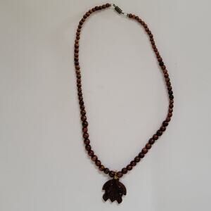 Hand Carved Wooden Beaded Necklace With Turtle Pendant And Brown Natural Beads